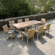 Load image into Gallery viewer, Outdoor wooden dining set with eight chairs on a stone patio.