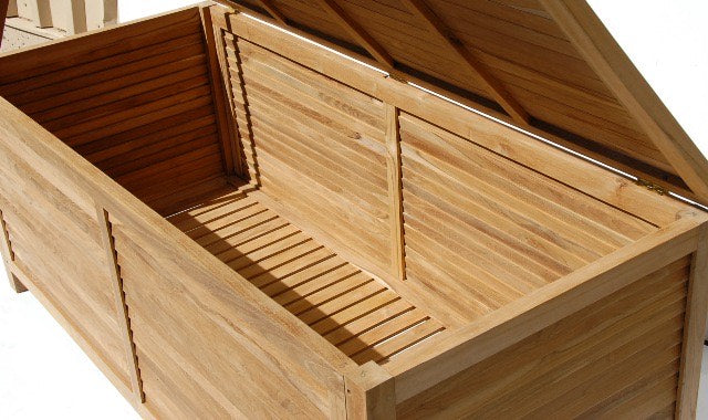 Inside view of teak storage with airy open slat base
